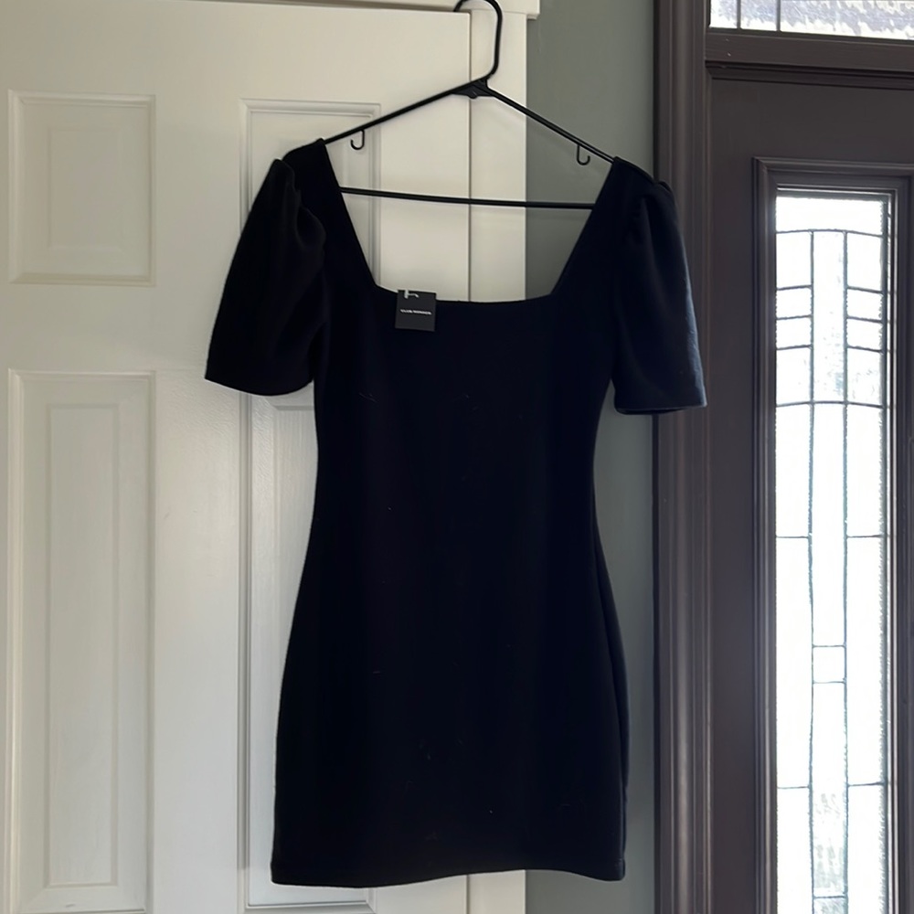 Black club monaco dress. Never worn. Great condition.